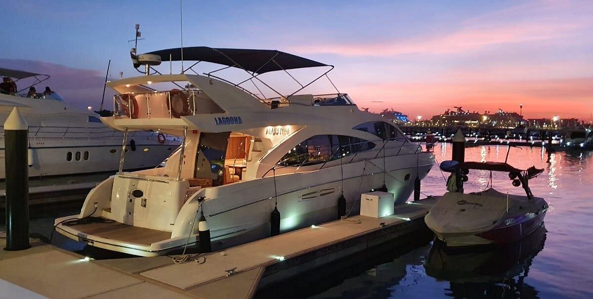 Family and friends enjoying yacht adventure in Qatar